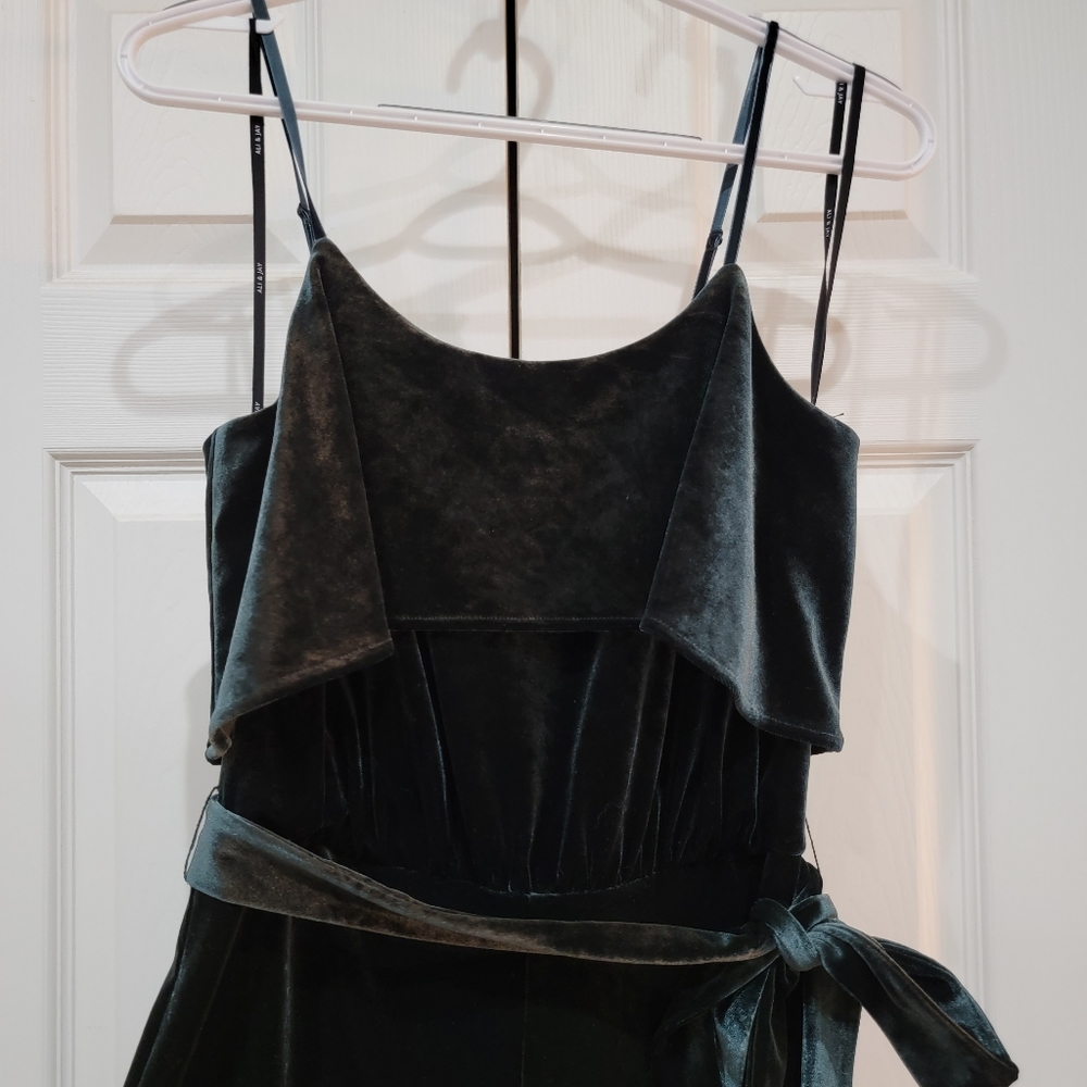 Ali & Jay emerald Green velvet jumpsuit in a size medium